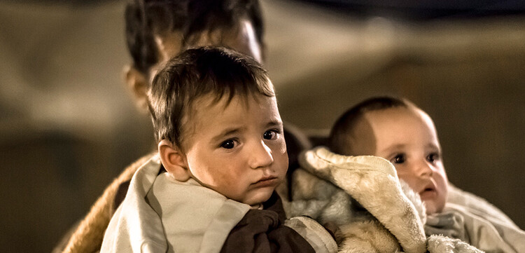 Ein kleines Kind im Flüchtlingscamp.