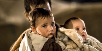 Ein kleines Kind im Flüchtlingscamp. Ein kleines Kind im Flüchtlingscamp.