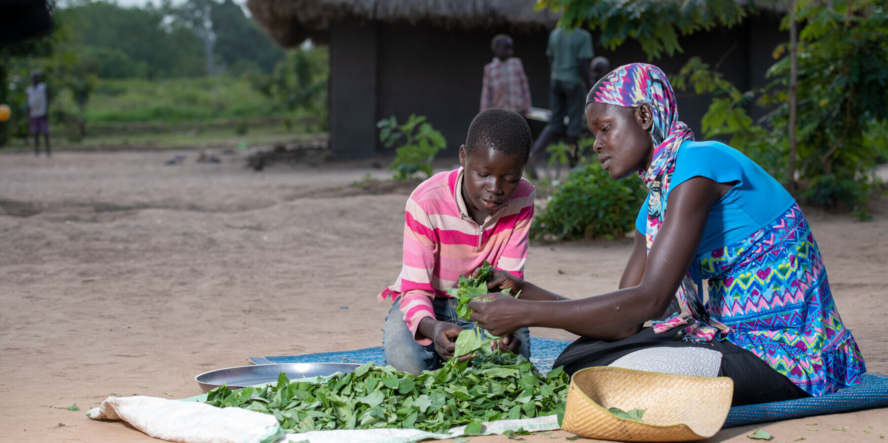 Edna und ihr Kind auf ihrem Hof im Südsudan Edna und ihr Kind auf ihrem Hof im Südsudan